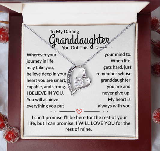 Necklace with heart pendant and sentimental message card in a decorative box.