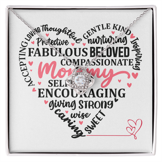 Necklace with heart-shaped pendant in a box with text